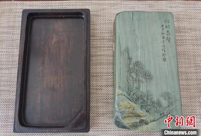 圖為盧保勝為提升洮硯文化內(nèi)涵，制作“一硯一銘、一盒一拓”成品展示?！堟?攝